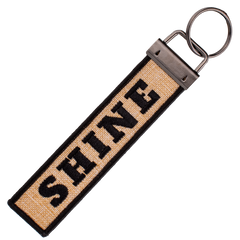 MOONSHINE BURLAP TAG KEYCHAIN